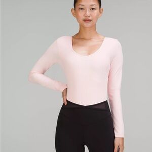Lululemon Athletica Light Pink Long Sleeve Bodysuit